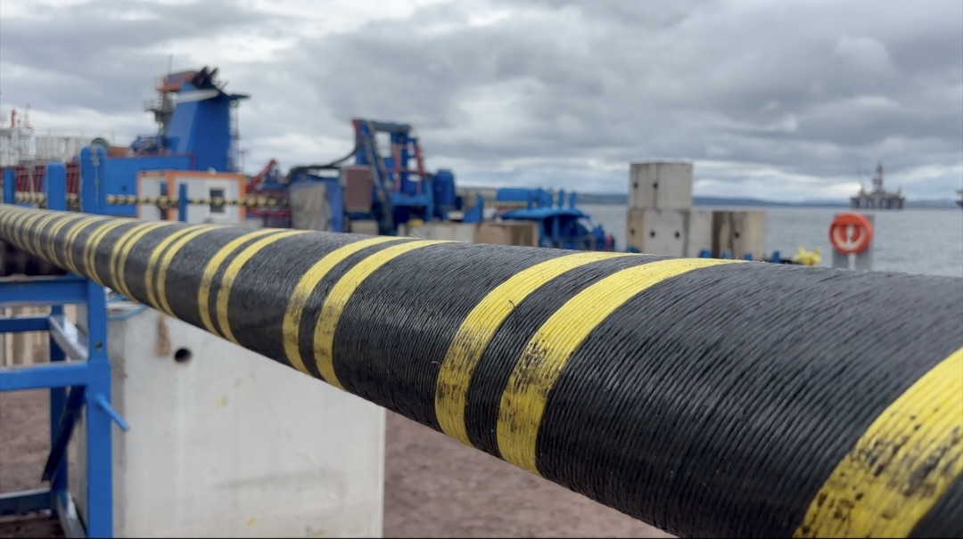 Image of subsea cable being loaded onto vessel at Port of Nigg July 2025