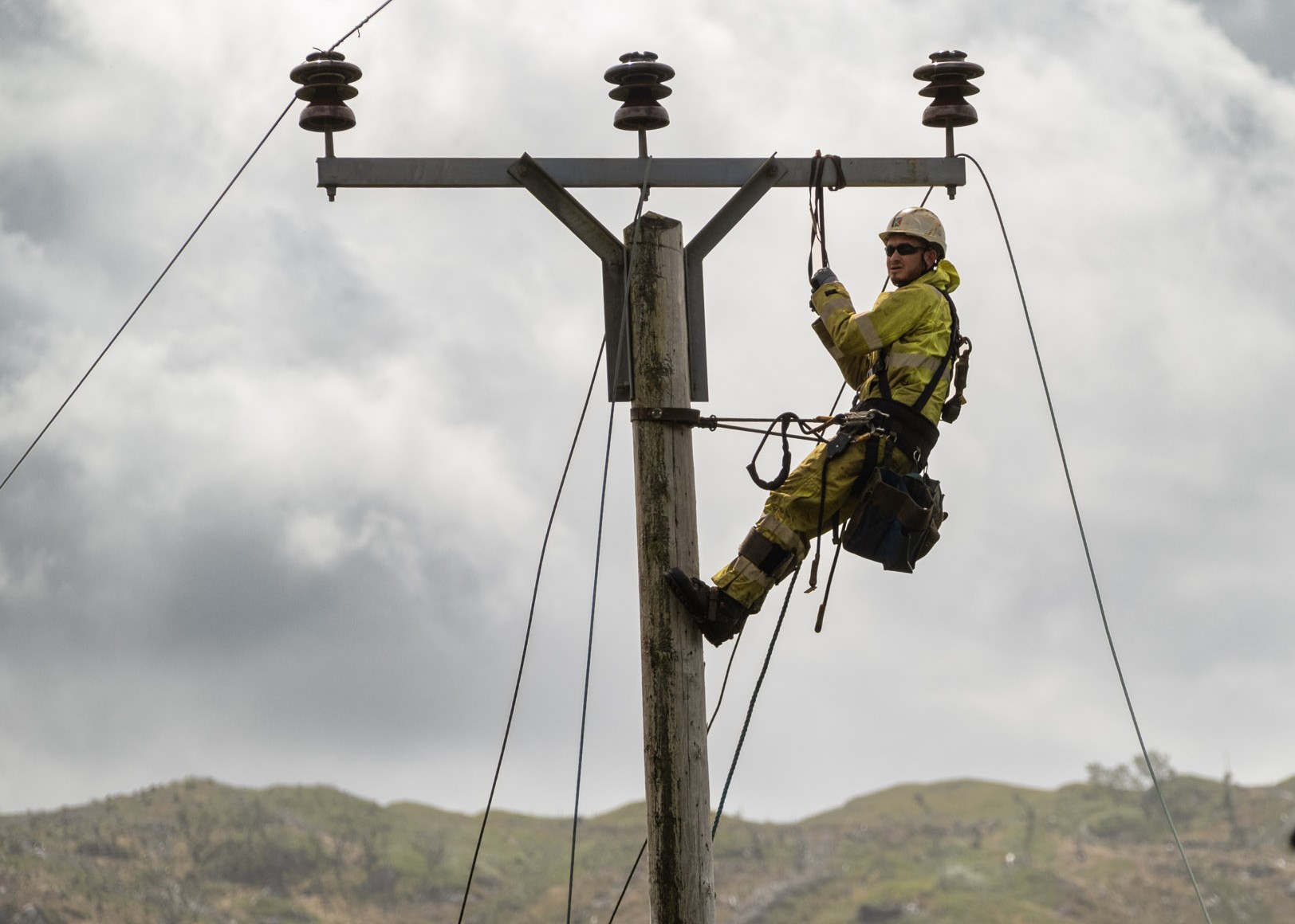 An SSEN engineer carrying out repairs to the network at height