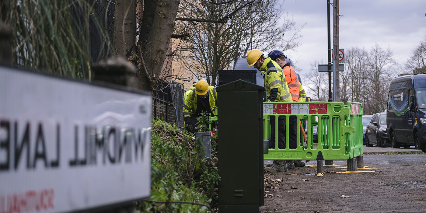 Image of engineers digging in residential street