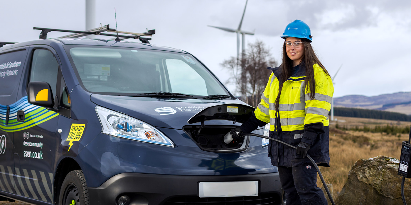 SSEN Engineer standing next to electric van 